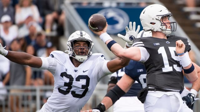 Penn State defensive end Dani Dennis-Sutton rushes quarterback Drew Allar in the Blue-White Game at Beaver Stadium.